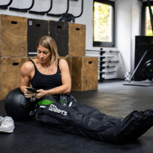 femme avec Pantalon de pressothérapie reboots go x mini